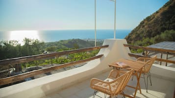 Panoramic Suite, Sea View | Outdoor dining