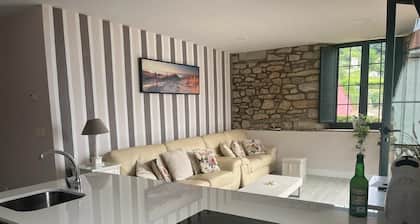 Perfect getaway in a typical Asturian house with sea views, garden and parking.
