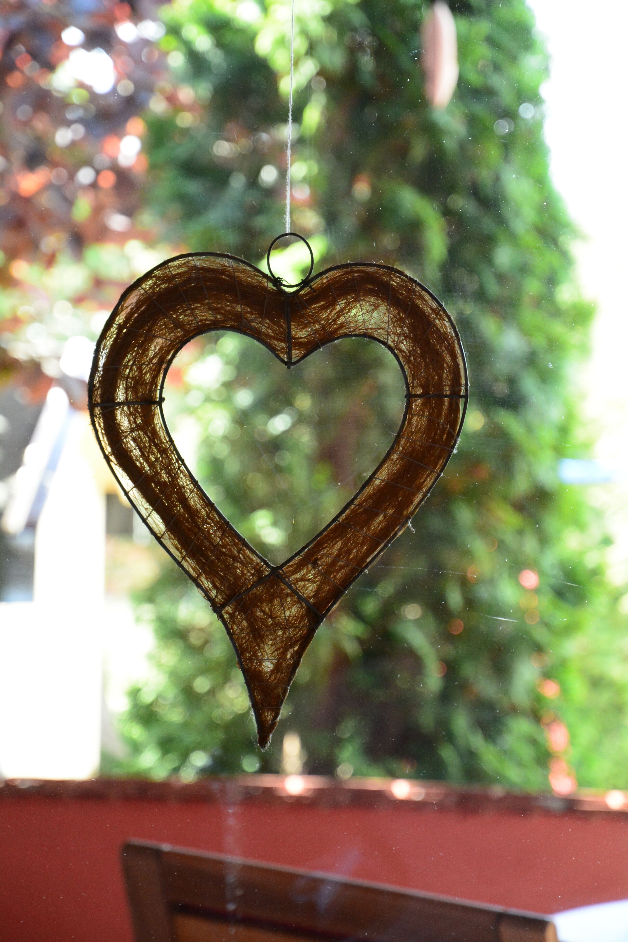 A heart-shaped hanging ornament.