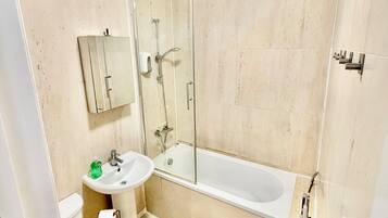 Hair dryer, towels, soap, toilet paper