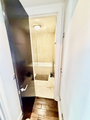 Hair dryer, towels, shampoo, toilet paper