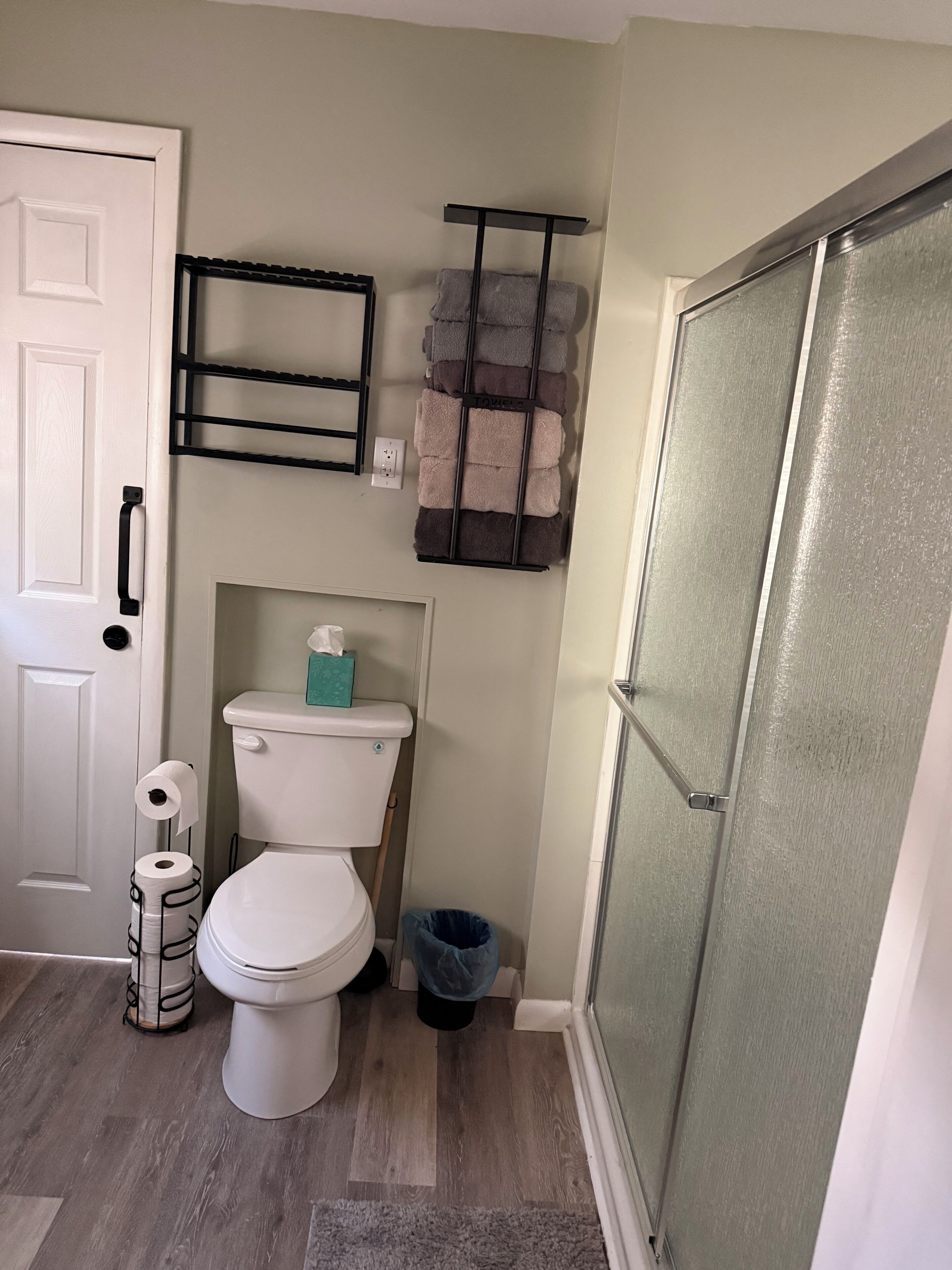 Shower, towels, soap, toilet paper