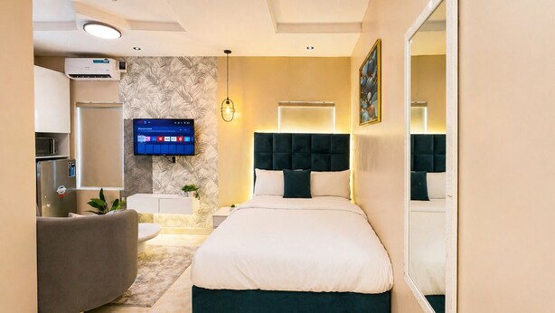 Deluxe Studio Suite | Down comforters, blackout drapes, iron/ironing board (on request) - Happy Lodge Shortlets & Suites (Lekki)
