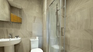 Ein Badezimmer mit einer Duschkabine, einem Waschbecken, einer Toilette und einem Mülleimer.