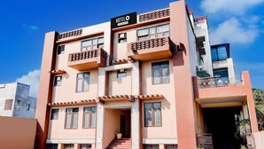 A multi-story hotel with a sign reading 'HOTEL O' and a staircase leading to the entrance. - Saver Double Sharda Nagar Lucknow (Lucknow)