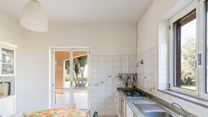 Fridge, microwave, dishwasher, cookware/dishes/utensils - Tarquinia Garden Home by Interhome (Tarquinia)