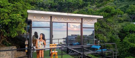 Bungalow Deluxe, balcon, vue sur la mer | Restauration en plein air