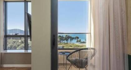 XIO Apartments | Stylish Comfort with Balconies & Full Kitchens