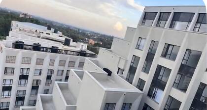 Cozy 1BR bnbFast WiFi + Netflix + Parking+washingmachine Near UN, Villagemarket
