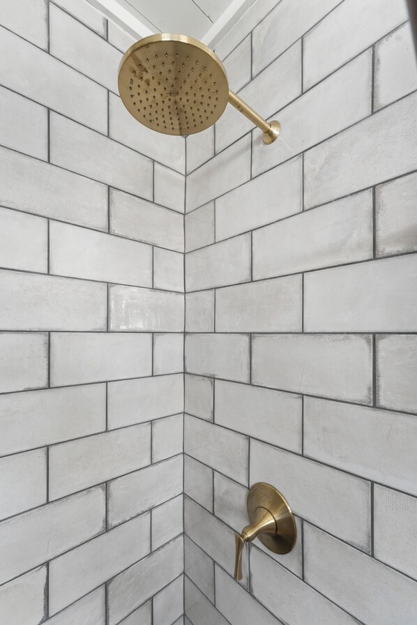 Shower, towels, soap, toilet paper