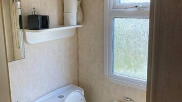 Shower, hair dryer, toilet paper