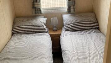 2 dormitorios, tabla de planchar con plancha, wifi y ropa de cama