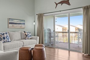 Smart TV, fireplace, books - Bird’s Nest | Ocean View Condo w/ Balcony (Surf City)