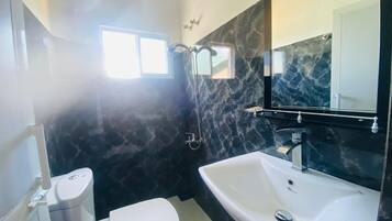 Deluxe Double or Twin Room, Balcony, Mountain View | Bathroom | Shower, towels, soap, shampoo