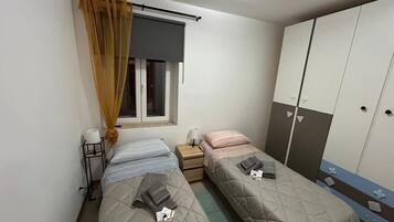 2 habitaciones y ropa de cama