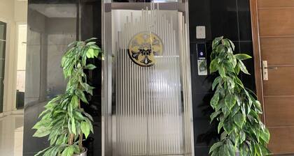 Cozy 1-bedroom apartment near Islamabad Airport with Free WiFi & AC