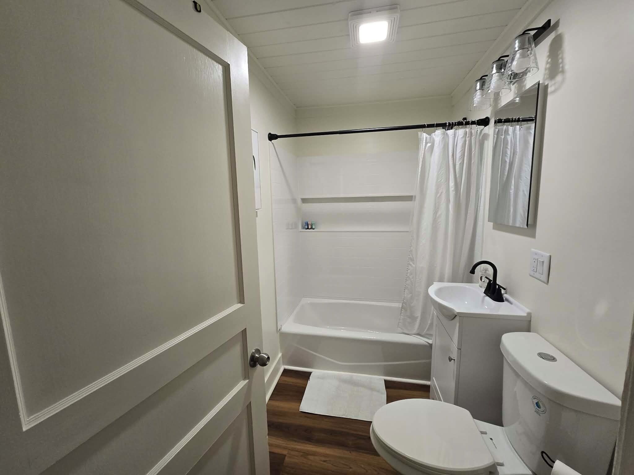Hair dryer, towels, soap, toilet paper