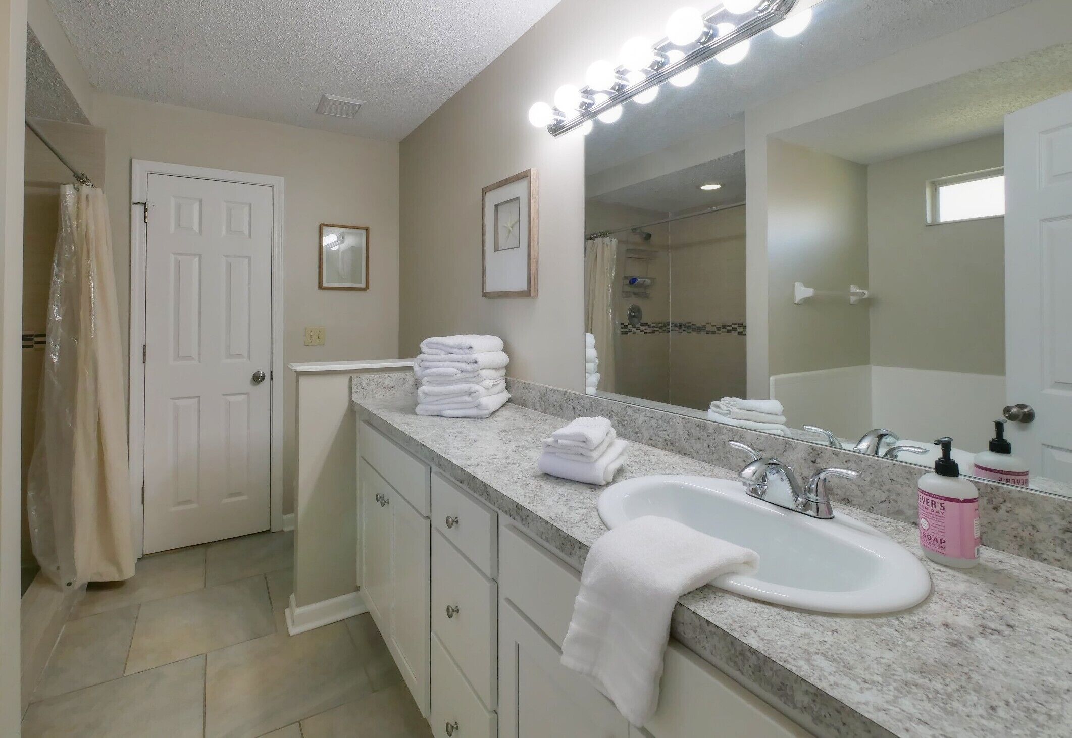 Jetted bath, hair dryer, towels, soap