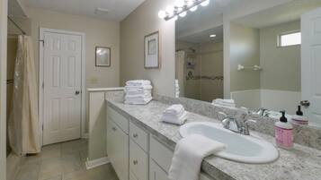 Jetted bath, hair dryer, towels, soap