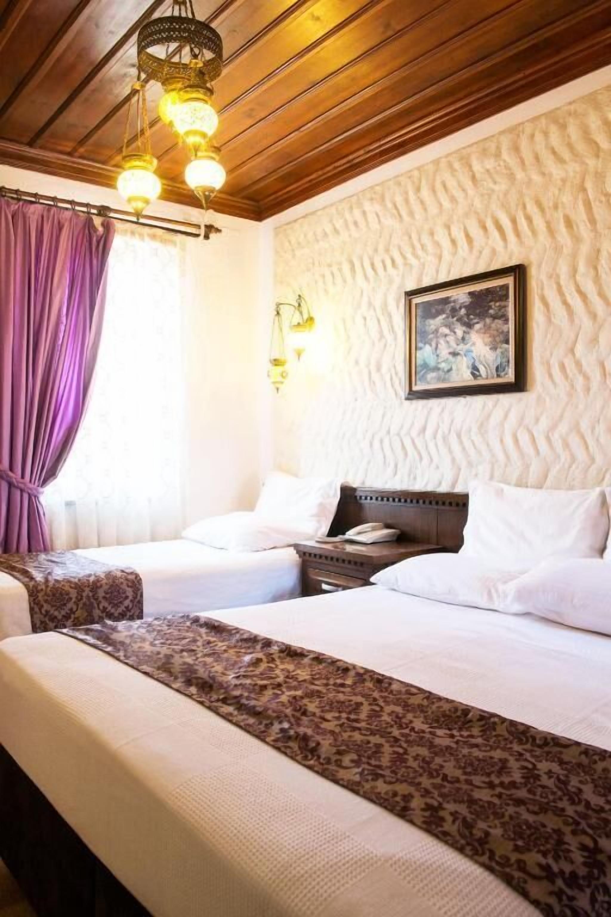 Quarto triplo standard, varanda, vista para o jardim