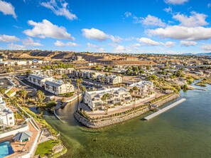 A coastal town with a marina, waterfront buildings, and a river. - Riverfront Marina Retreat with Pool! (Bullhead City)
