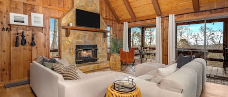 Smart TV, fireplace, table football, books