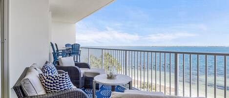 Private balcony view overlooking the elevated resort-style pool at Harbour Pointe 301, offering a unique vantage point of the waterfront and a perfect spot to relax and take in the beauty of Perdido Key.