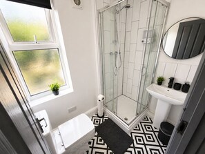 Shower, towels, soap, shampoo