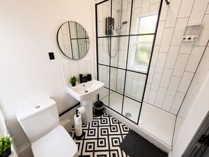 Shower, towels, soap, shampoo