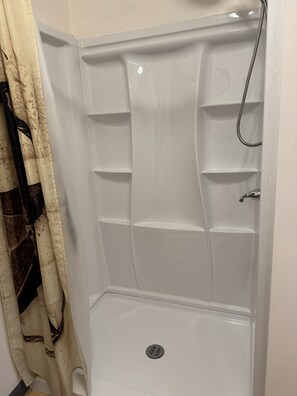 Shower, towels, toilet paper