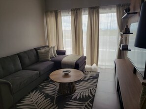 Apartamento, 2 quartos, sacada | Sala de estar