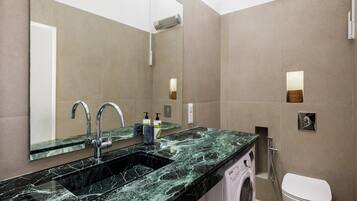 Hair dryer, towels, soap, shampoo