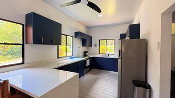 Club House, Patio, Pool View | Private kitchen