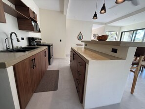 Fridge, microwave, oven, stovetop - Villas Marboleda – Tropical Oasis w/ Saltwater Pool Near Playa Negra Surf (Los Pargos)