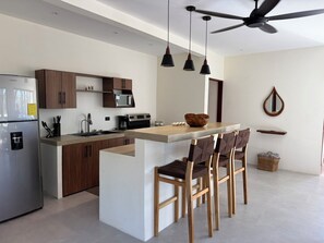 Fridge, microwave, oven, stovetop - Villas Marboleda – Tropical Oasis w/ Saltwater Pool Near Playa Negra Surf (Los Pargos)