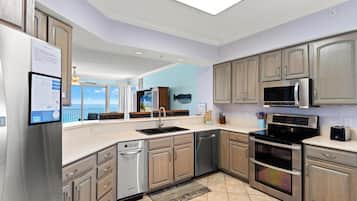 Condo, 3 Bedrooms, Ocean View, Beachfront | Private kitchen | Full-size fridge, microwave, oven, stovetop