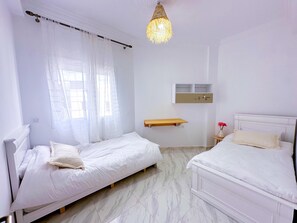 Comfort Apartment, 2 Bedrooms, Garden View | Laptop workspace, blackout drapes, iron/ironing board, free WiFi - Elite Holiday Homes - Akdital & Aéroport (Fes)
