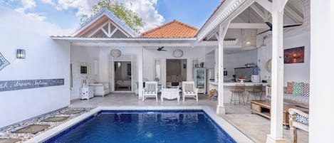 Outdoor pool, pool umbrellas, pool loungers