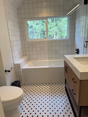 Shower, eco-friendly toiletries, hair dryer, towels