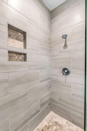 Shower, towels, soap, toilet paper