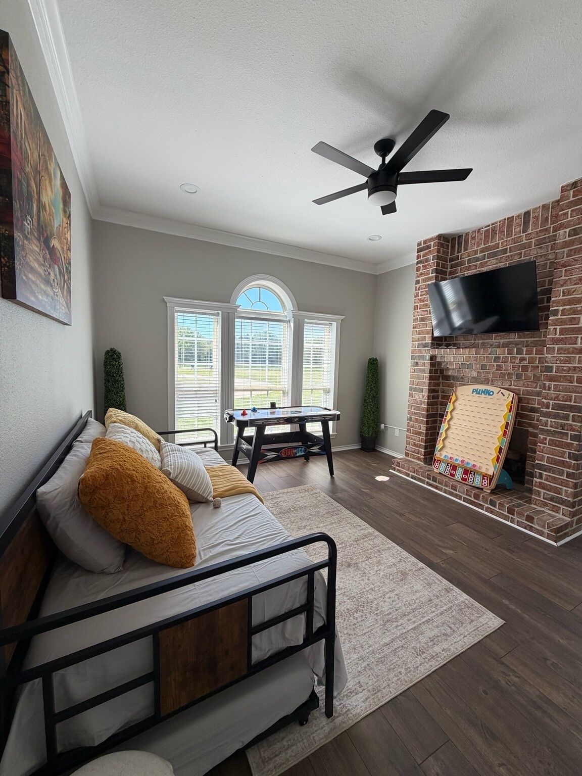 Smart TV, fireplace, foosball, books