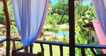 Cozy 2-bedroom house in welcoming Mambajao with AC