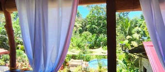 Cozy 2-bedroom house in welcoming Mambajao with AC