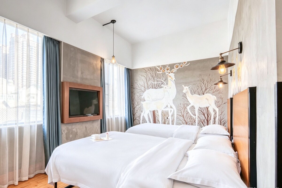 Family Triple Room, City View | Down duvets, desk, laptop workspace, blackout curtains