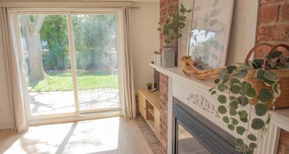 Cozy Retro Suite with Garden Walkout, Games & Lounge!