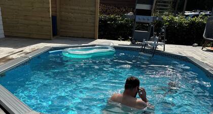 Charming carriage house with axes to heated pool