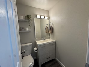 Hair dryer, towels, soap, toilet paper