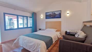 Luxury Suite, Balcony, City View | Blackout drapes, soundproofing, free WiFi