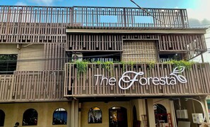 A building with a sign reading 'The Foresta' and a balcony with plants. - The Foresta By Ohana (Yogyakarta)