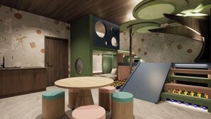 Suite estudio familiar, vista al patio | Área infantil